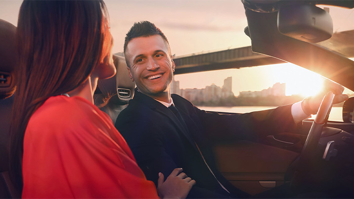 Couple living an autumn romance on a driving date