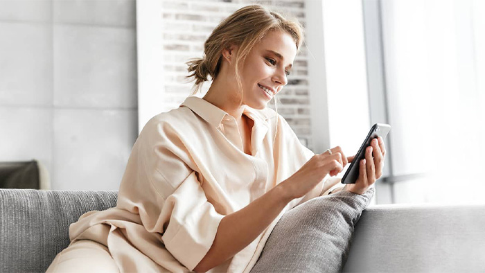 Woman checking for Beige Flags on a dating profile