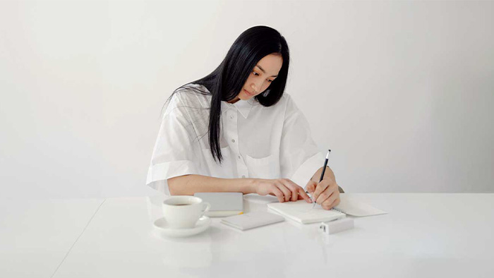 Attractive Dater Writing in a Journal