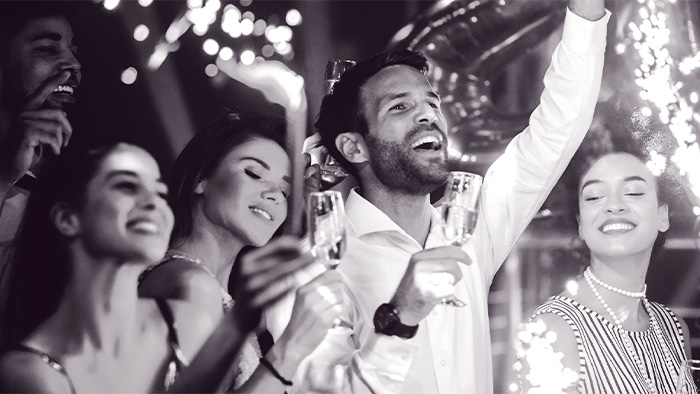 Seeking couple attending a celebration