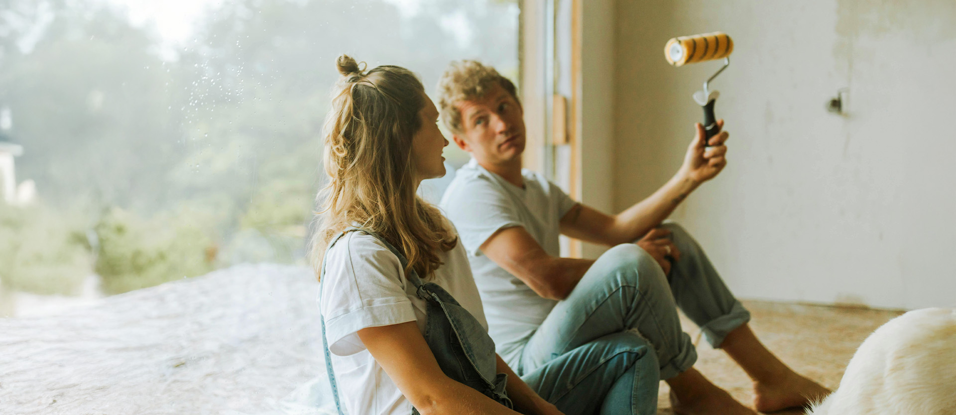 Couple discussing a painting job