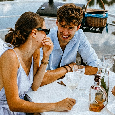 Couple seated outdoors
