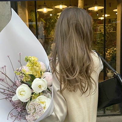 Woman receiving flowers