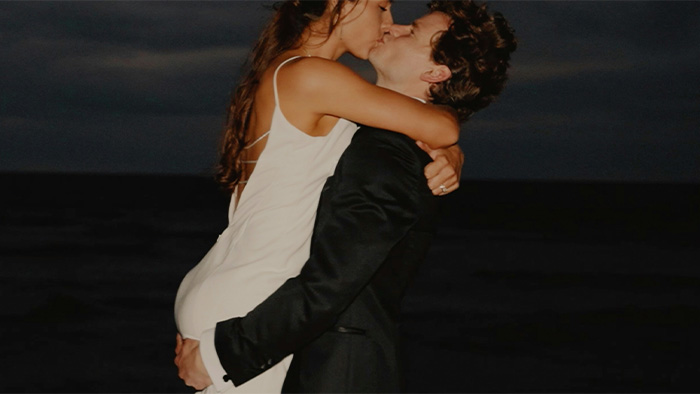 Couple on the beach at night