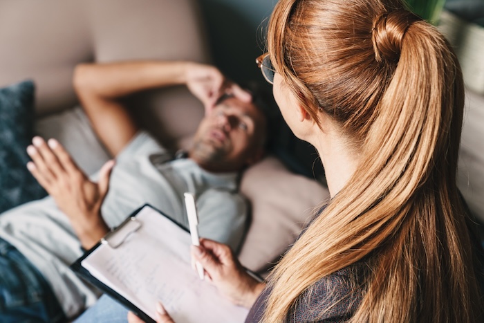 Man in therapy session